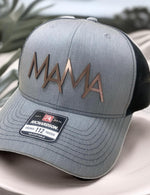 a gray and black trucker hat with the word mam on it