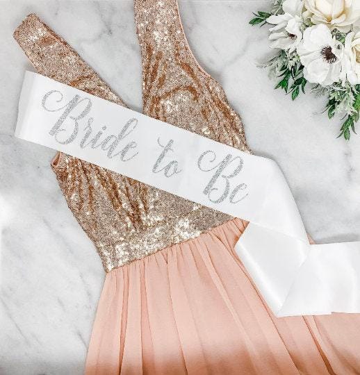 bachelorette party, bridesmaid proposal, bridal shower gift, bride sash, bridesmaid gift, maid of
honor gift, bride to be, gift for bride, party decorations, maid of honor, rose gold, bachelorette
favors, bride sash