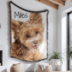 Personalized pet photo blanket featuring a custom-printed image of an adorable puppy on a soft, woven cotton throw. This cozy, high-quality blanket serves as an ideal pet memorial or unique gift for pet lovers, dog moms, and families cherishing their furry friend. Perfect for birthdays, memorials, or as a heartfelt tribute, this custom-designed pet keepsake adds warmth and sentiment to any home decor.