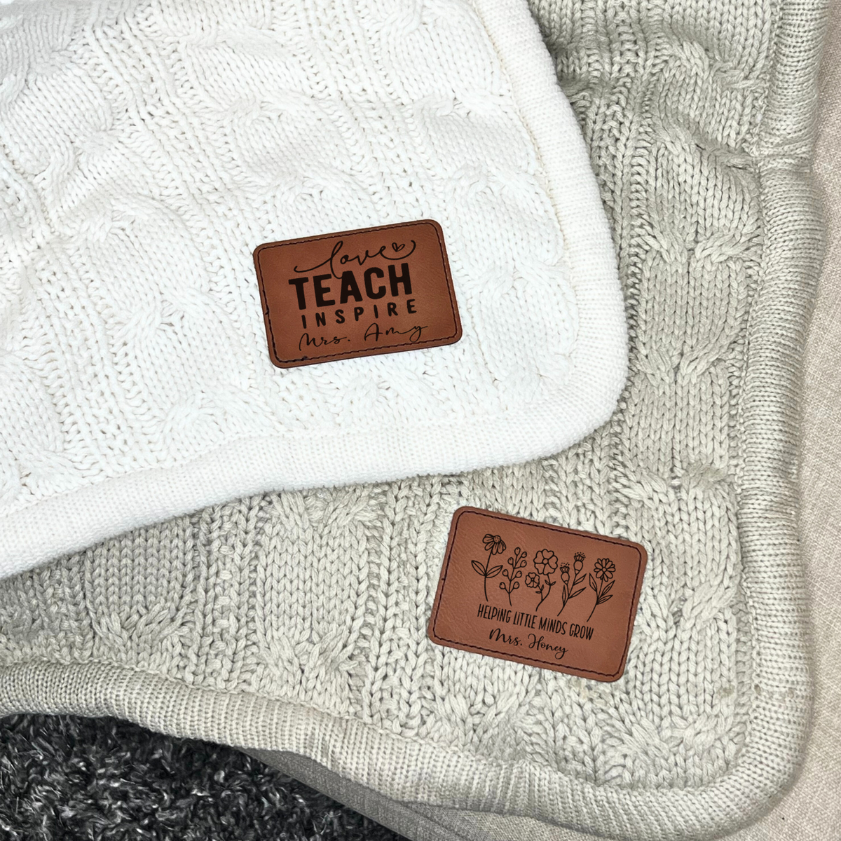 a close up of a sweater with a tag on it
