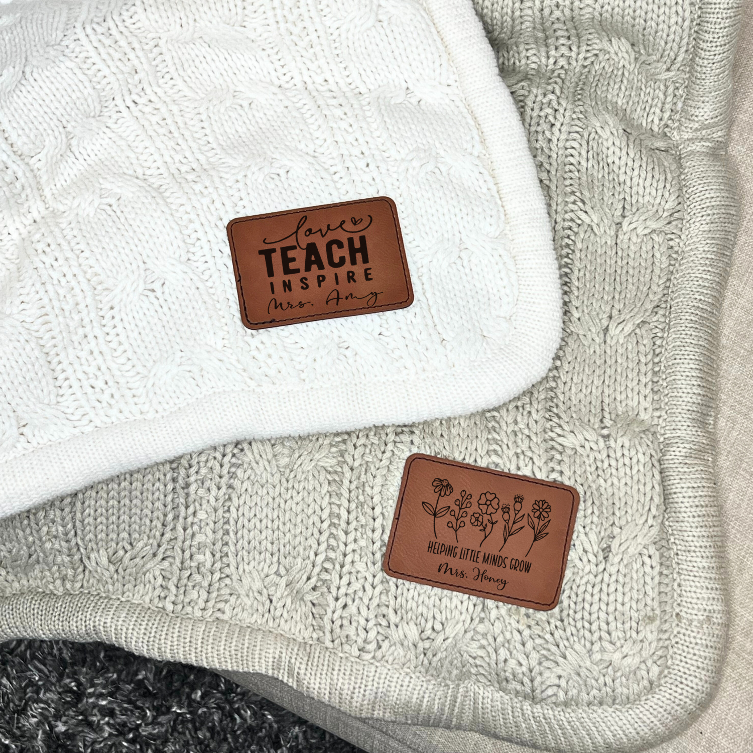 a close up of a sweater with a tag on it