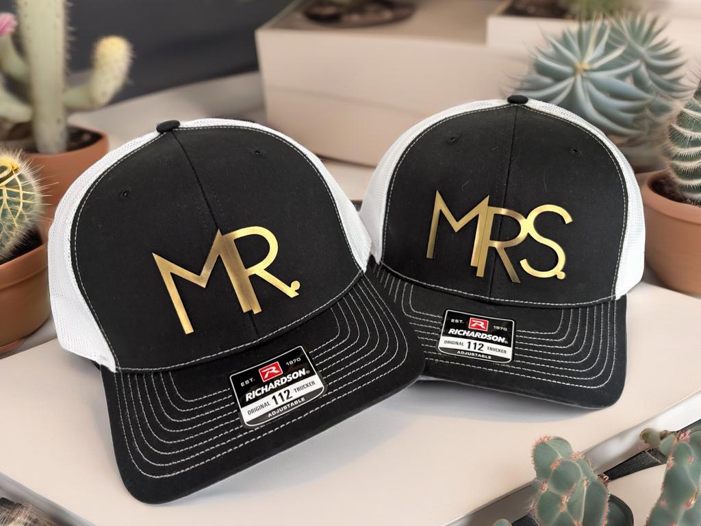 a couple of hats sitting on top of a table